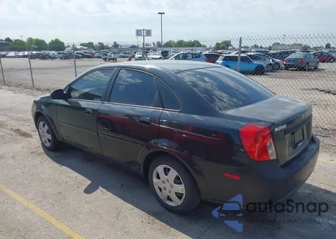 2004 Suzuki Forenza S из США, поврежденный, VIN KL5JD52Z44967910